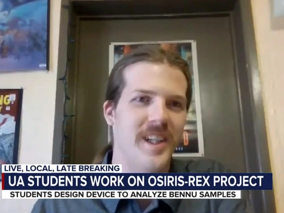 Screencap of a newscast, in which a student is talking via a zoom call. Bottom third says "UA Students Work on OSIRIS-REx Project"