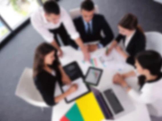 Group of people around a desk