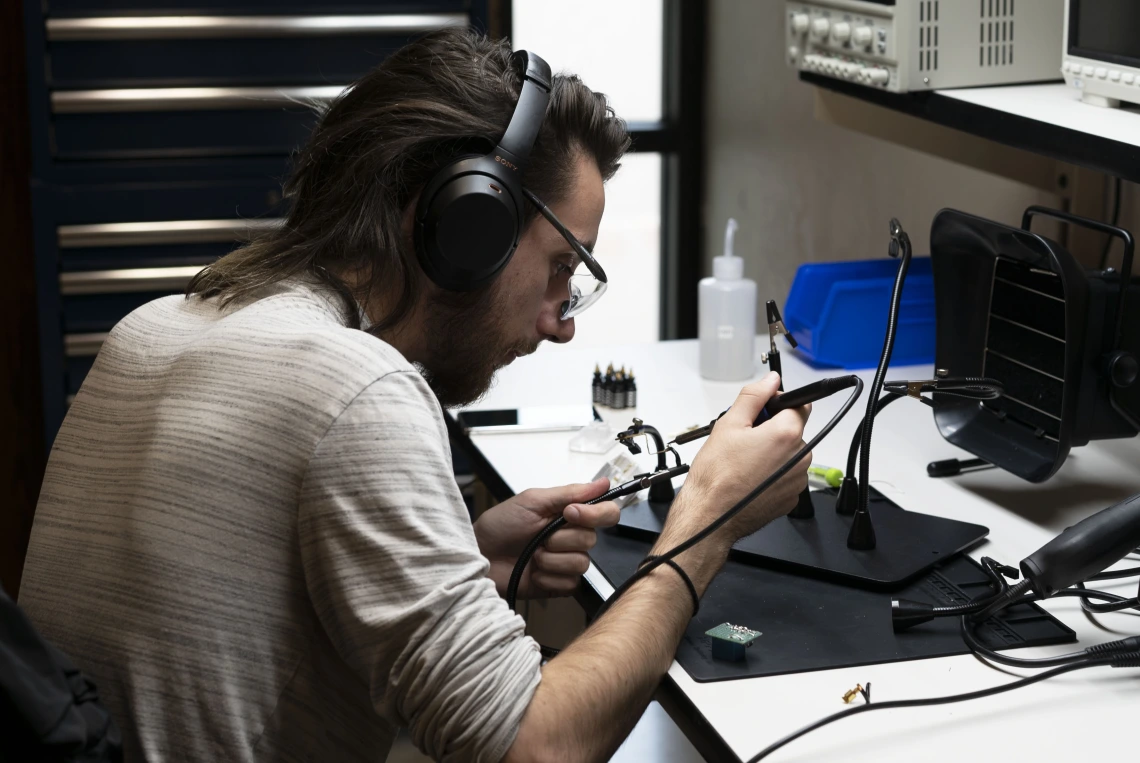 A student works on a project in the Engineering Design Center