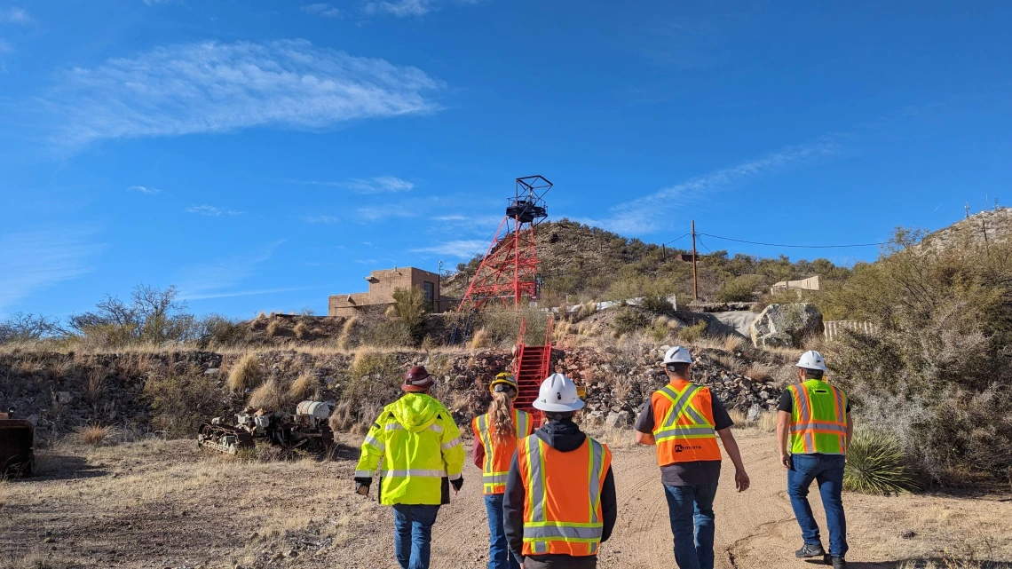 5 students outdoors at a mining site