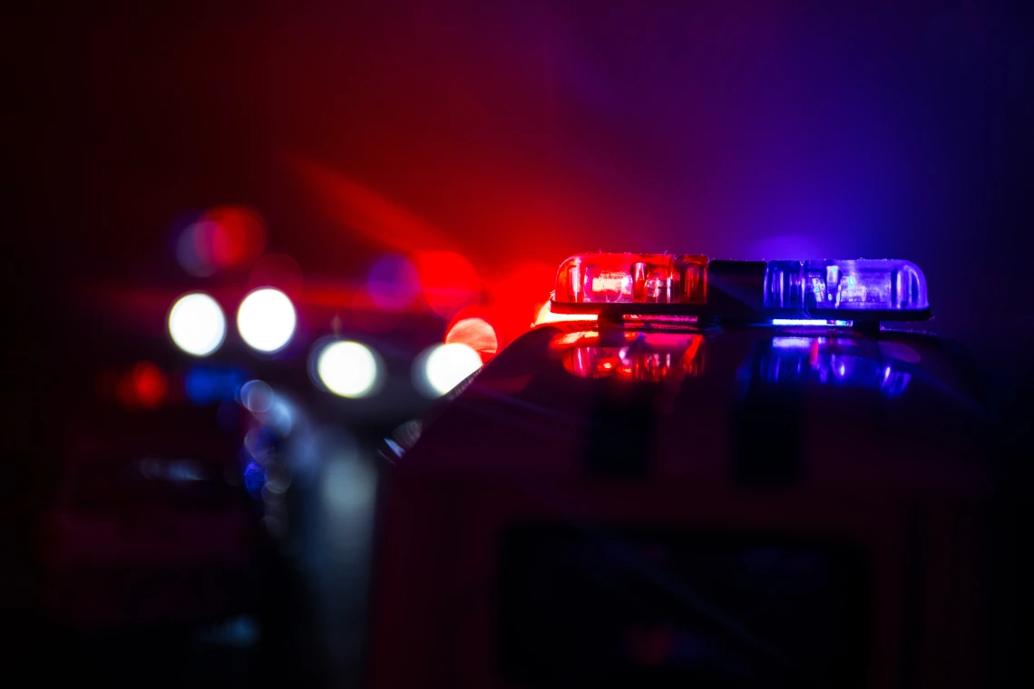a police car with lights flashiing