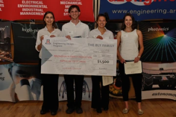 Team 16098 University students with a large award check
