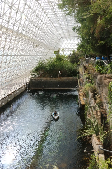 a boat travels on the enclosed ocean within Biosphere 2