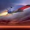 A hypersonic vehicle flys across a sunset sky.
