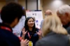 a student presents to judges at Design Day