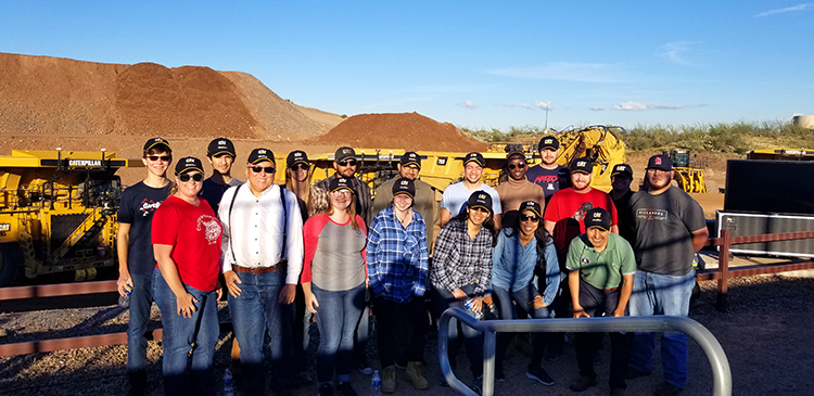 18 Engineering students from the University of Arizona at caterpillar vehicle demonstration